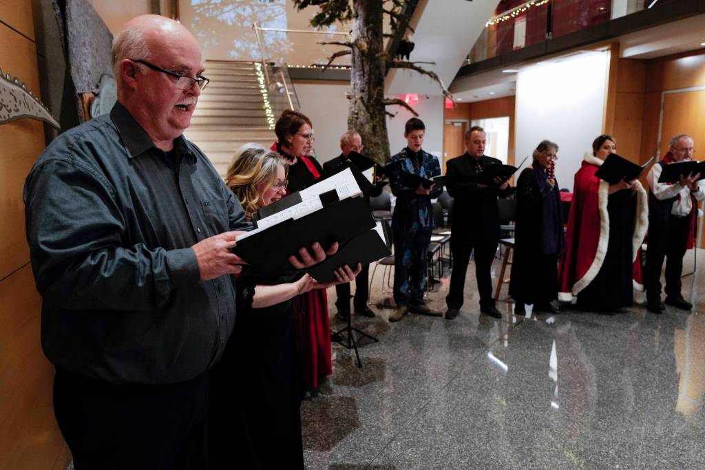 Members of Vox Borealis perform at the Alaska State Library, Archives, and Museum Building during Gallery Walk on Friday, Dec. 6, 2019. (Michael Penn | Juneau Empire)