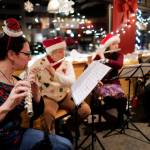 Members of Flutatious perform at Heritage Coffee during Gallery Walk on Friday, Dec. 6, 2019. (Michael Penn | Juneau Empire)