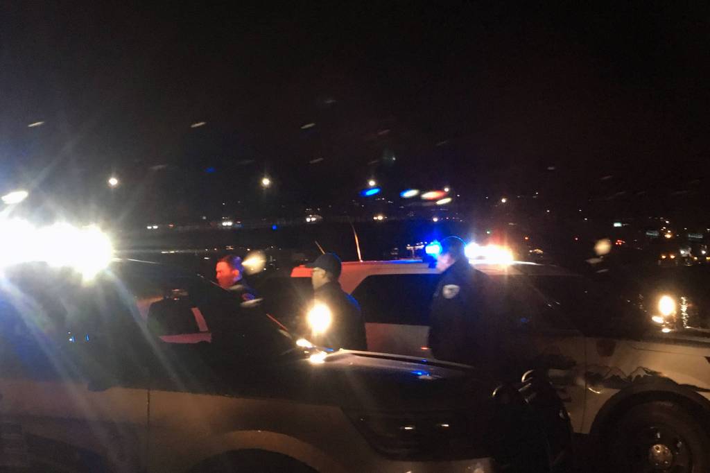 Juneau police officers respond to Douglas Breeze In on Monday evening. (Michael S. Lockett | Juneau Empire)