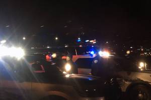 Juneau police officers respond to Douglas Breeze In on Monday evening. (Michael S. Lockett | Juneau Empire)