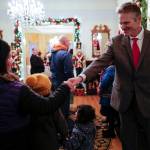 Gov. Mike Dunleavy, R-Alaska, greets Juneau residents at the Governors Open House on Tuesday, Dec. 10, 2019. (Michael Penn | Juneau Empire)