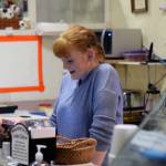 Udder Culture featuring Aurora Sweets co-owner Randi Pearce rings up a customer on Tuesday Dec. 10, 2019. (Nolin Ainsworth | Juneau Empire)