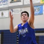 Braden Jenkins lays the ball up during boys varsity basketball practice at Thunder Mountain High School on Tuesday, Dec. 10, 2019. (Michael Penn | Juneau Empire)