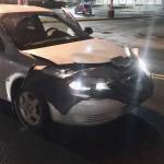 The vehicle involved in a crash in front of The Salvation Army Family Store is seen Wednesday night. (Michael S. Lockett | Juneau Empire)