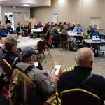 Kitty Farnham facilitates a cruise ship impact meeting for neighbor associations at Elizabeth Peratrovich Hall on Wednesday, Dec. 11, 2019. (Michael Penn | Juneau Empire)