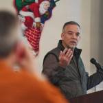 Norwegian Cruise Line Holdings executive Howard Sherman speaks to the Juneau Chamber of Commerce during its weekly luncheon at the Moose Lodge on Thursday, Dec. 12, 2019. (Michael Penn | Juneau Empire)