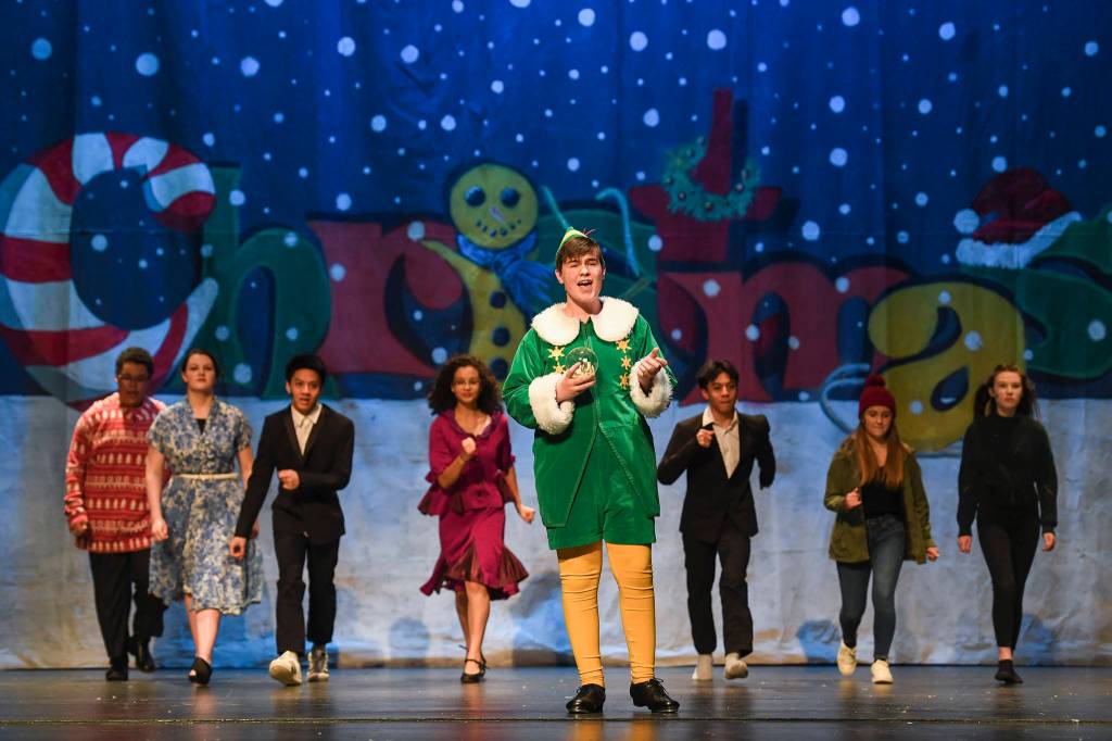 Toby Russell, stars as Buddy the Elf, during rehearsal of Elf, the Musicial at Juneau-Douglas High School: Yadaa.at Kalé on Friday, Dec. 13, 2019. (Michael Penn | Juneau Empire)