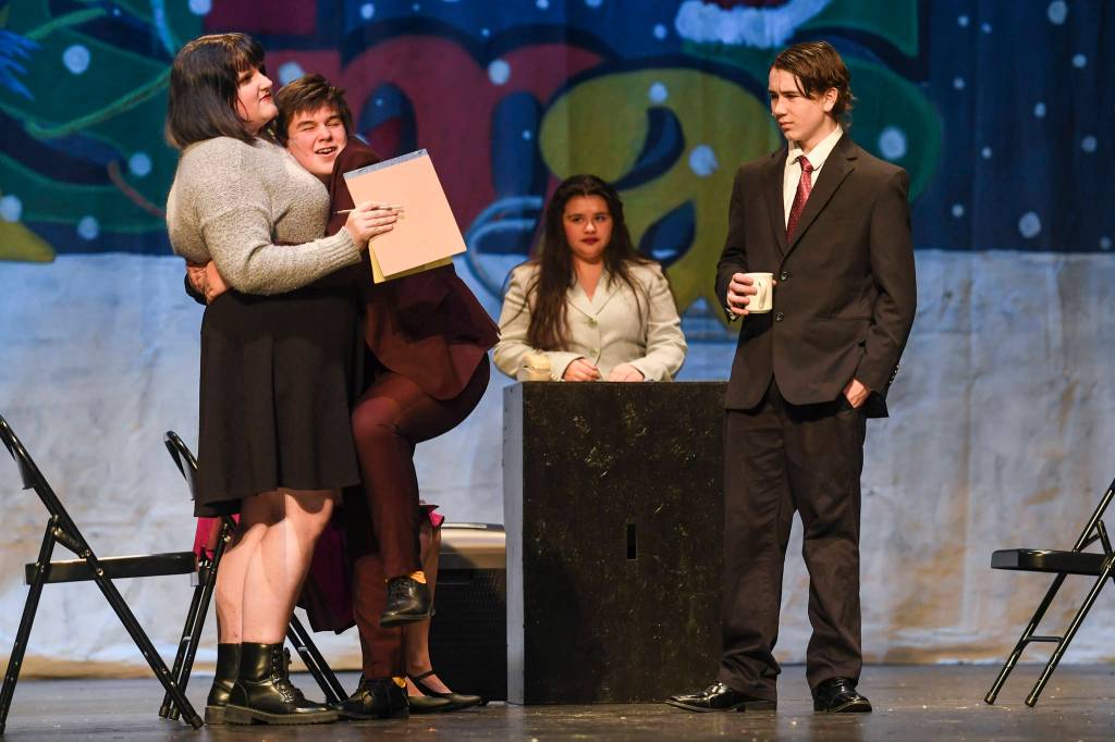 Naomi Buck, left, Toby Russell, Rylee Rosson and Jager Hunt, right, rehearse Elf, the Musicial at Juneau-Douglas High School: Yadaa.at Kalé on Friday, Dec. 13, 2019. (Michael Penn | Juneau Empire)