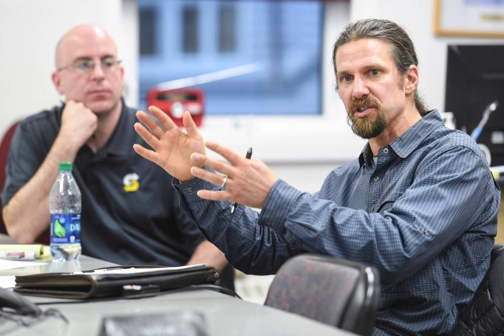Eaglecrest Ski Area General Manager Dave Scanlan, right, speaks during a task force meeting at City Hall looking into summer activities at the city-owned ski resort on Thursday, Dec. 19, 2019. (Michael Penn | Juneau Empire)