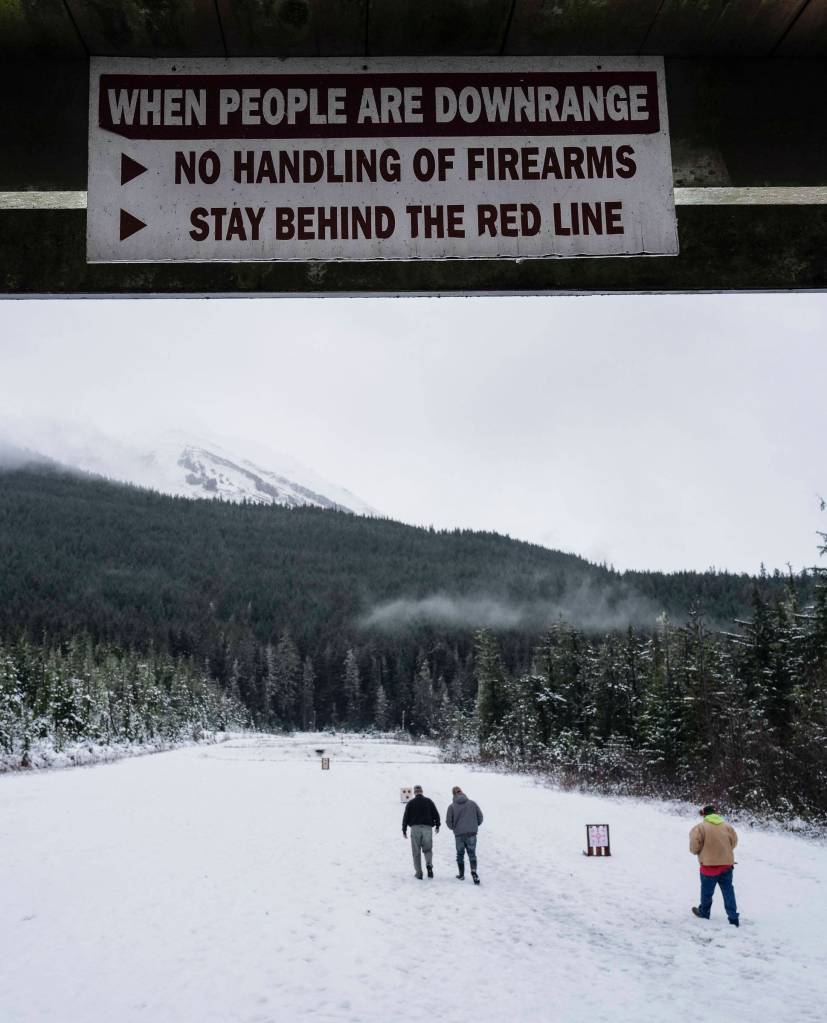 Shooters check on their targets at the Hank Harmon Rifle Range on Montana Creek Road on Wednesday, Dec. 18, 2019. (Michael Penn | Juneau Empire)