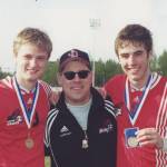 Juneau-Douglas High School soccer coach Gary Lehnhart, center, poses senior Justin Dorn, left, and Luke Knowles following the Crimson Bears win over Dimond in the 2001 state championship in Anchorage. Dorn was inducted into the ASAA High School Hall of Fame on May 5, 2019. (Courtesy Photo | Susan Knowles)