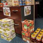 Workers at the Department of Law in Juneau donated more than $2,000 and more than 1,000 pounds of food to charities this year. (Courtesy photo | Department of Law)