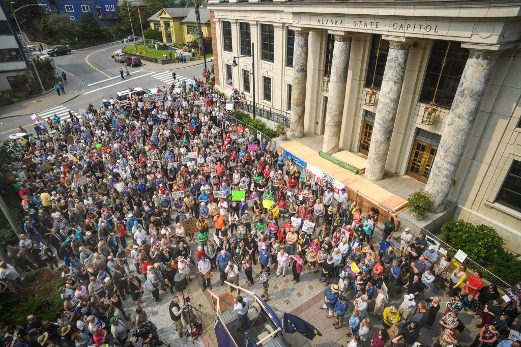 Hundreds attend a rally in front of the Capitol calling for an override of Gov. Mike Dunleavys budget vetoes on the first day of the Second Special Session of the Alaska Legislature in Juneau on Monday, July 8, 2019. (Michael Penn | Juneau Empire)