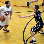 North Poles Alijah Agee is defended by Haines Carson Crager in their game at the Princess Cruises Capital City Classic at JDHS on Monday, Dec. 30, 2019. (Nolin Ainsworth | Juneau Empire)