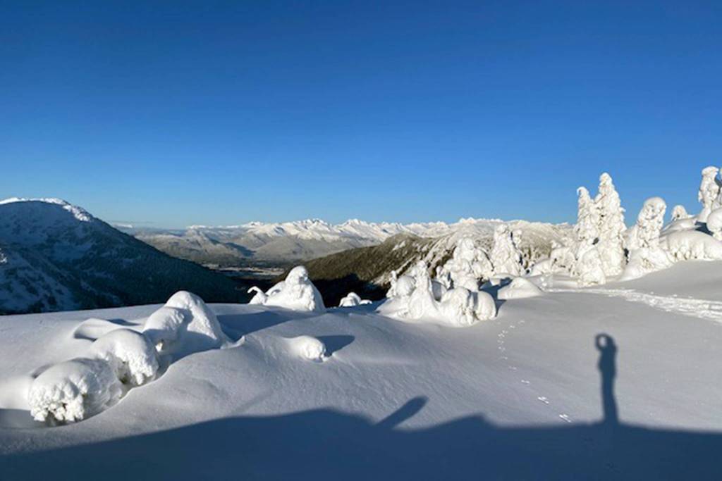Courtesy photos | Ben Ng                                Just me and my shadow: Ben Ng snaps a picture on Pittman Ridge Thursday morning, Jan. 9. The view shows the Juneau International Airport in the background. Below, his view from Pittman Ridge shows Youngs Bay and Admiralty island in the distance.
