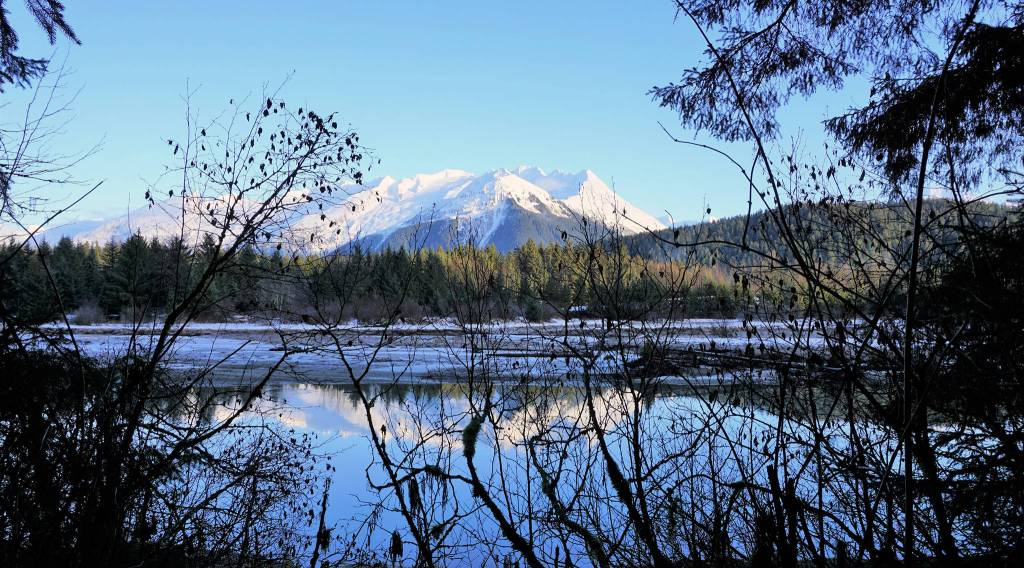 Fresh snow dots the mountains in this view from Eagle River on Dec. 15, 2019. (Courtesy photo | Michael Craig Smith)