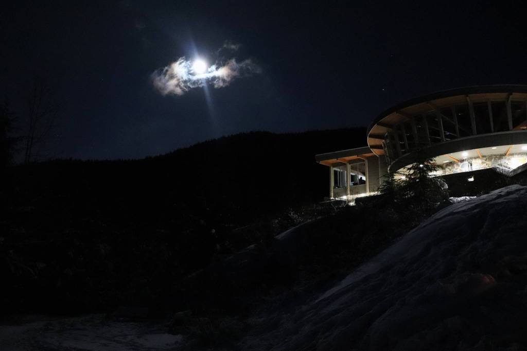 The full moon glows over the Mendenhall Visitor Center on Jan. 11, 2020. (Courtesy photo | Bryan Cormack)