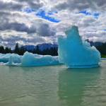 An icebergs reaches up and out of the water in Shakes Lake in the Stikine River in the Stikine-LeConte Wilderness Area. (Vivian Faith Prescott | For the Capital City Weekly)
