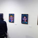 Ben Hohenstatt | Capital City Weekly                                A Juneau-Douglas City Museum attendee looks at artwork by Inari Kylänen.