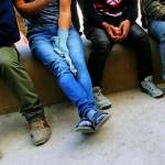 Young immigrant men wait at the border of Mexico and Arizona. (Gail Kocourek | Courtesy Photo)