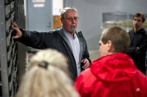 Eric Prestegard, outgoing executive director of Douglas Island Pink & Chum, Inc., leads a tour of the Macaulay Salmon Hatchery in this January 2016 file photo. (Michael Penn | Juneau Empire File)