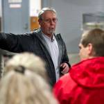 Eric Prestegard, outgoing executive director of Douglas Island Pink & Chum, Inc., leads a tour of the Macaulay Salmon Hatchery in this January 2016 file photo. (Michael Penn | Juneau Empire File)