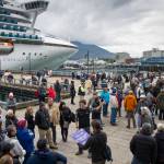 Cruise ship visitors gather for their tours on the Seawalk on Wednesday, Sept. 13, 2017. (Michael Penn | Juneau Empire File)