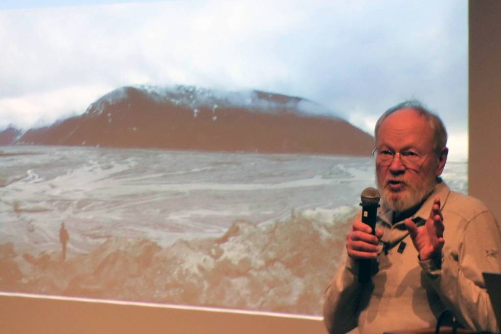 Glaciologist Roman Motyka speaks during a presentation about Taku Glacier Saturday, Jan. 11 at University of Alaska Southeast. (Ben Hohenstatt | Juneau Empire)