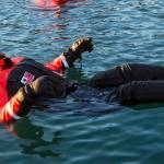 Petty Officer 2nd Class Steven Knight waits for their fifteen minute swim to be up during cold water survival training at Coast Guard Station Juneau, Jan. 13, 2020. (Michael S. Lockett | Juneau Empire)
