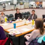 AmeriCorps servicemembers meet for a monthly meeting to discuss their work and a possible joint volunteer project, Jan. 10, 2020. (Michael S. Lockett | Juneau Empire)