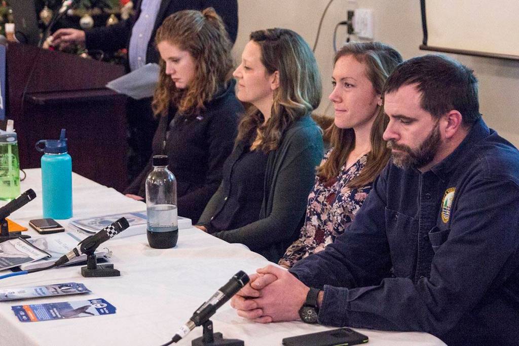 photos by Michael S. Lockett / Juneau Empire                                 Stakeholders prepare to speak to members of the Juneau Chamber of Commerce about whale watching tours during a luncheon Jan. 16.