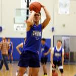 Ben Hohenstatt | Juneau Empire                                 Thunder Mountain High School point guard Bryson Echiverri hoists a shot at practice Jan. 22.