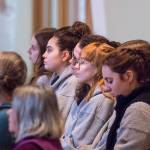 Servicemembers of the AmeriCorps program listen during a Martin Luther King Jr. Day community celebration held at St. Pauls Catholic Church on Jan. 20, 2020. (Michael S. Lockett | Juneau Empire)