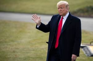 Alex Brandon | Associated Press                                President Donald Trump waves as he walks on the South Lawn of the White House before departing on Marine One, Thursday in Washington.