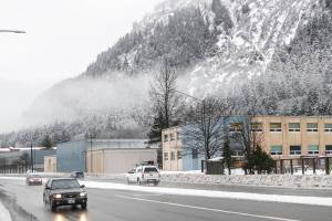 Cars drive past Harris Harbor on Jan. 22, 2020. (Michael S. Lockett | Juneau Empire)