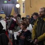 Guests stand in line for a hot lunch at the Juneau Coalition for Housing and Homelessness 9th annual Homeless Connect event at the Juneau Arts and Culture Center Wednesday. (Michael S. Lockett | Juneau Empire)