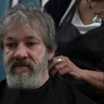 Steven Lythgoe gets his hair cut by Jamiann Hasselquist at the Zach Gordon Youth Center during the Juneau Coalition for Housing and Homelessness 9th annual Homeless Connect event, Jan. 29, 2020. (Michael S. Lockett | Juneau Empire)