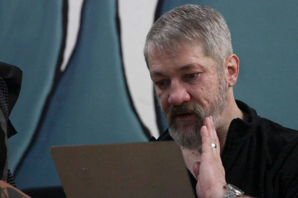 Steven Lythgoe gets his hair cut by Jamiann Hasselquist at the Zach Gordon Youth Center during the Juneau Coalition for Housing and Homelessness 9th annual Homeless Connect event, Jan. 29, 2020. (Michael S. Lockett | Juneau Empire)