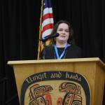 Meilani Schijvens, owner and director of Rain Coast data and former executive director of Southeast Conference, gives a presentation on Southeast Alaska By the Numbers at Elizabeth Peratrovich Hall, Tuesday. (Ben Hohenstatt | Juneau Empire)