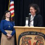 Foundroot co-owner Leah Wagner and Spruce Root Boardmember Susan Bell share a laugh after Bell told Wagner that Wagners company makes magic happen at Bells dinner table during the presentation of the Path to Prosperity awards Wednesday, Feb. 5, 2020. (Ben Hohenstatt | Juneau Empire)