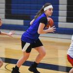 Avery Kreischer, center, is guarded by Mary Neal Garcia, left, and Mary Khaye Garcia during girls varsity basketball practice at Thunder Mountain High School on Monday. All three played well in this weeks Dimond Lady Lynx Prep Shooutout tournament, said TMHS girls basketball coach Andy Lee. (Michael Penn | Juneau Empire File)