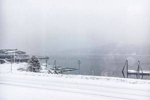 Valentines Day starts with the falling snow on the Gastineau Channel Friday. (Michael S. Lockett | Juneau Empire)