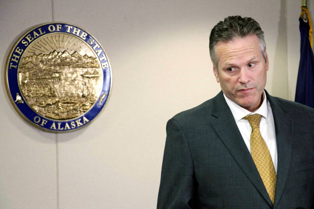 In this Sept. 26 file photo, Gov. Mike Dunleavy listens during a news conference in Anchorage. (AP Photo | Mark Thiessen)