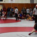 Matches were being held two at a time during the 2020 Southeast Alaska Middle School Wrestling Championship at Floyd Dryden Middle School on Friday. (Peter Segall | Juneau Empire)