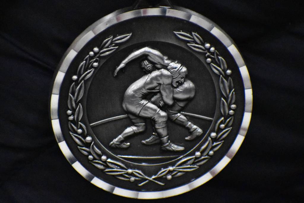 A second place medal to be awarded in the 2020 Southeast Alaska Middle School Wrestling Championship on Friday. (Peter Segall | Juneau Empire