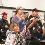 Members of the crowd stand in recognition of Elizabeth Peratrovich during the Elizabeth Peratrovich Day celebration at the Tlingit and Haida Community Council on Sunday. (Michael S. Lockett | Juneau Empire)