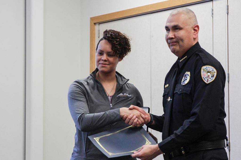 Officer CJ Warnaca of the Juneau Police Department was awarded the Outstanding Police Service Award by Chief Ed Mercer on Tuesday. (Michael S. Lockett | Juneau Empire)