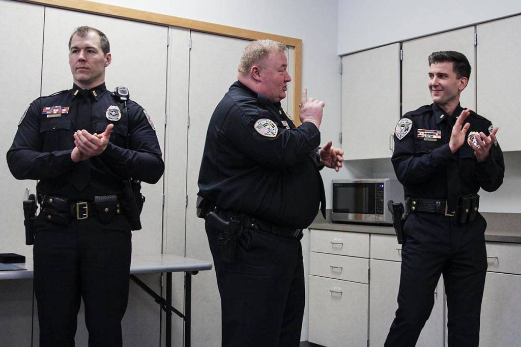 Lt. Krag Campbell, Lt. Scott Erickson, and Lt. Jeremy Weske of the Juneau Police Department were recognized for their recent accomplishments in command schools across the company by Chief Ed Mercer on Tuesday. (Michael S. Lockett | Juneau Empire)