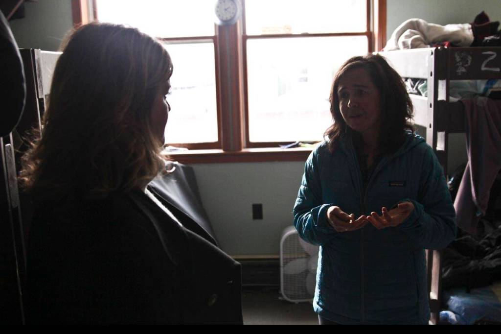 Heather Handyside, left, GCIs vice president of corporate communication and community engagement, speaks to Mariya Lovishchuk, executive director of the Glory Hall, about the shelters needs during a visit on Friday. (Michael S. Lockett | Juneau Empire)