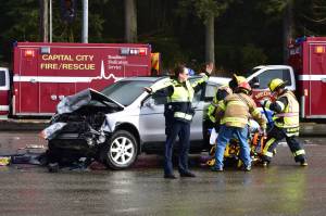Photos by Peter Segall | Juneau Empire                                Juneau Police Department and Capital City Fire/Rescue at the site of a car crash at the intersection of Egan Drive and Glacier Highway on Thursday, Feb. 27, 2020.